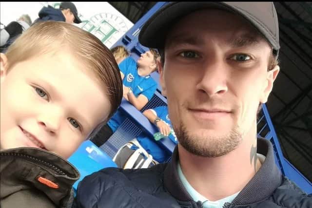 Steve Betteridge, pictured with son Archie, has created a crowdfunding campaign to raise money to cancel Kenny Jackett's Pompey contract