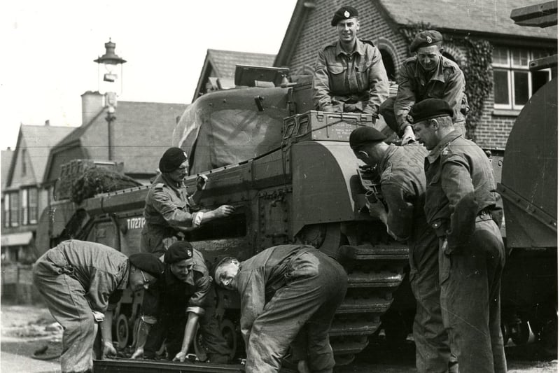 Churchill tank crews making their final preparations.