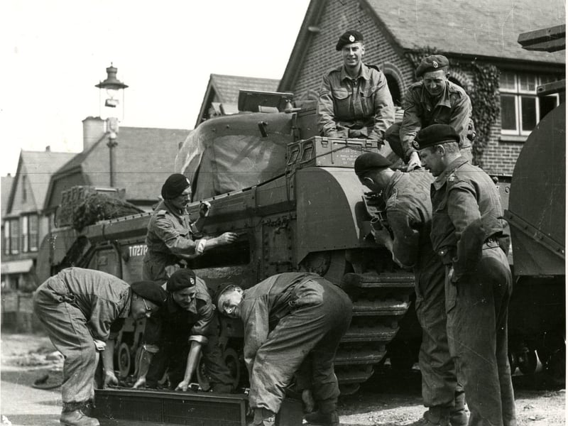 Churchill tank crews making their final preparations.