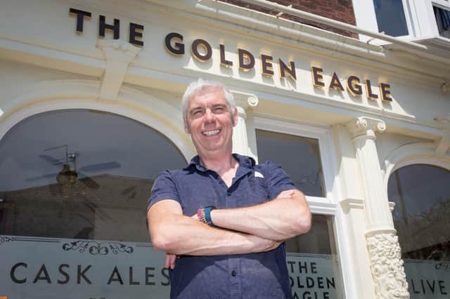 Pub landlord, Phil Estell, in front of his pub, The Golden Eagle in Southsea.
