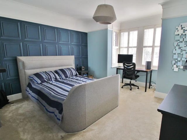 The listing says: "Situated in the favoured hillslope location of Augustine Road, sits this beautifully presented four bedroom family residence."