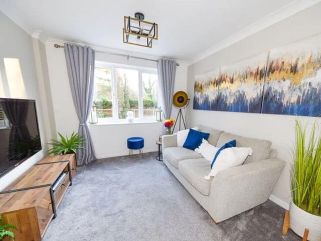 The listing says: "This property benefits from double glazing, gas central heating system, double garage with electric roller door, lounge, snug/study, modern fitted kitchen/family room, separate utility room, cloakroom/W.C, first floor family bathroom, bedroom one and two with en-suite's, driveway parking for multiple vehicles, landscaped rear garden and hot tub, and viewing is a must for all serious buyers."