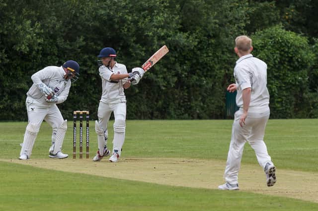 Purbrook 2nds bowler Sam Brown beats the bat during his side's loss to Portsmouth & Southsea 3rds. Picture: Mike Cooter