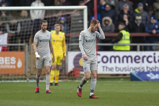 Skipper Tom Naylor looks dejected as Pompey slipped to a 1-0 loss at promotion rivals Fleetwood. Picture: Daniel Chesterton/phcimages.com