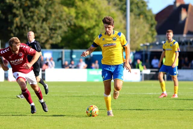 Andreas Robinson in FA  Cup action against Paulton Rovers. Picture by Tom Phillips