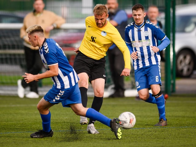 Burrfields (yellow) v Wickham. Picture: Keith Woodland