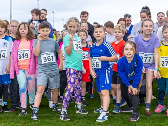 Kids get ready at the start line of the under 12 Fun Run  Photos by Alex Shute