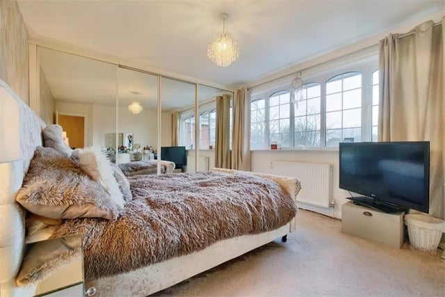 There are four additional double bedrooms, all with built-in wardrobes.