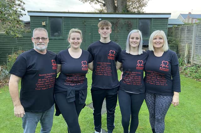 Members of the Gumbrell family walked 30 miles in memory of son and brother Callum, who died at just one week old. Pictured: Jeff, Lucy, Mackenzie, Katie and Julie Gumbrell