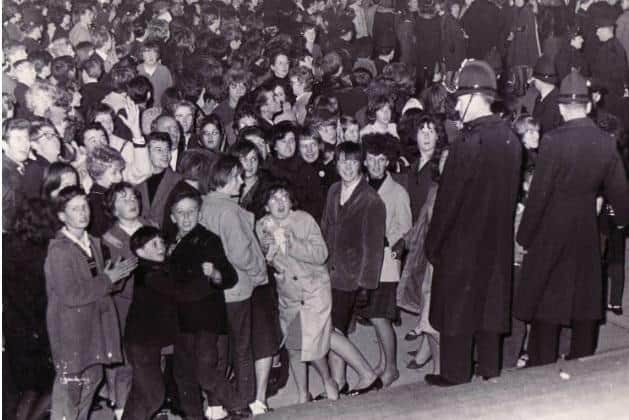 The adoring crowds waiting for The Beatles to perform at Portsmouth Guildhall in the 1960s