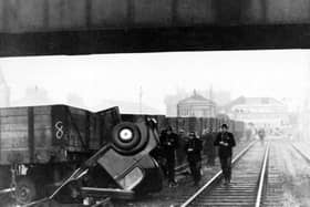 An accident at Cosham in which a train shunted this car down the track from the level crossing.