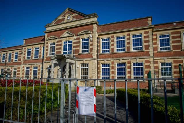 Mayfield School with a sign on the gates telling parents about the closure of the school due to the threat of an explosive device