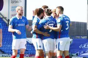 Pompey celebrate Ryan Williams' goal in their win over Rochdale. Picture: Joe Pepler
