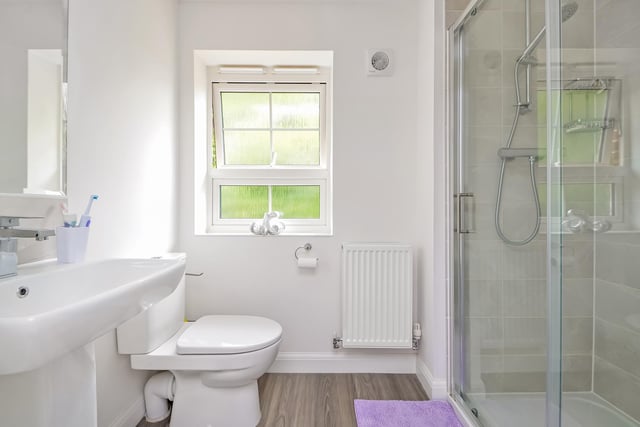 This three bedroom property is on the market at a guide price of £415,000. It is listed by Town and Country.