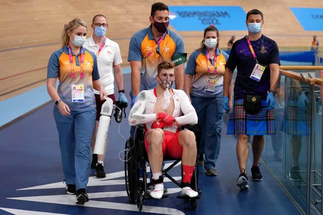 Joe Truman is helped from the track after crashing during a Men's Kierin heat at Lee Valley VeloPark. Picture by John Walton/PA Wire.