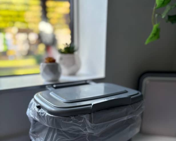 Indoor food waste caddy shown with a liner in place — perfect for collecting kitchen scraps cleanly and conveniently before transferring to the outdoor bin.
