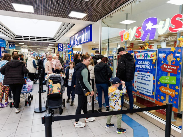 Families queued ahead of the opening of the store with the first 50 children receiving goodie bags.