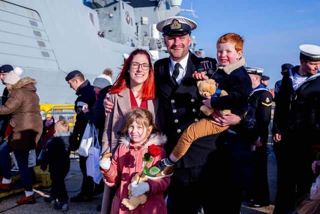 Steph Leonard with husband Lt Cdr Tom Leonard and their children Penny, seven, and Sebby, four, at HMS Diamond's homecoming.
Picture: Habibur Rahman