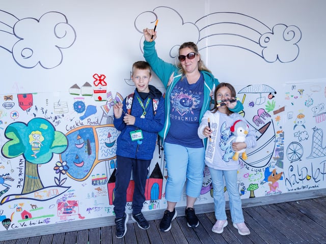 Rebecca with her daughter Katie and son Charlie at the seekers stall. Picture:Marcin Jedrysiak