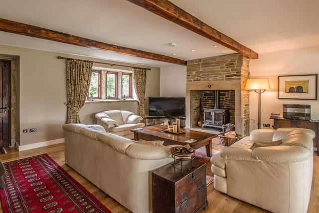 Perfect for relaxing, the lounge area has bundles of character, with Mullion style windows, wooden flooring, beamed ceilings and a stunning stone fireplace at its heart.