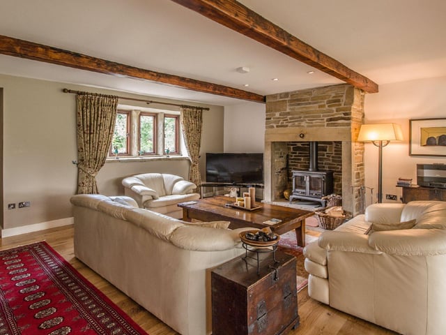 Perfect for relaxing, the lounge area has bundles of character, with Mullion style windows, wooden flooring, beamed ceilings and a stunning stone fireplace at its heart.