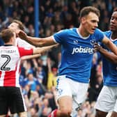 Kal Naismith scored twice in Pompey's 6-1 hammering of Cheltenham on the final day of the 2016-17 League Two season.
