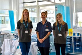 Ellis and Isabelle along with Catherine Willson in the Health and Fitness Suite at Fareham College’s Bishopsfield Road Campus.