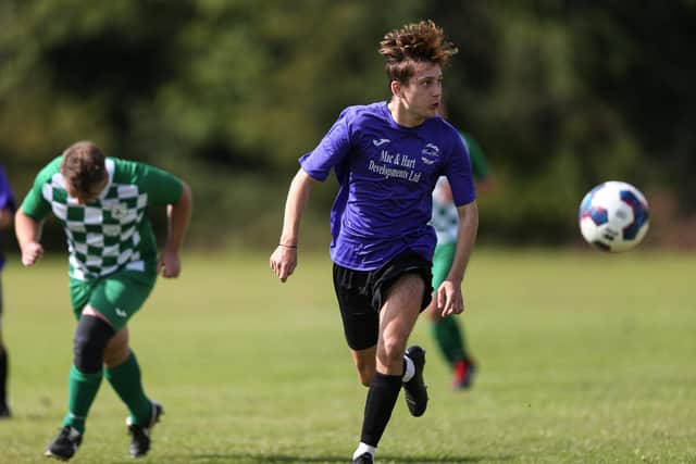 Jacob Wade of East Lodge on the ball against Mob Albion. Picture: Chris Moorhouse