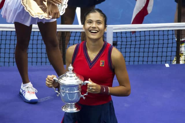 Emma Raducanu poses with the trophy after winning the women's singles final of the US Open. Picture: Michael Nagle/Xinhua/PA Wire.
