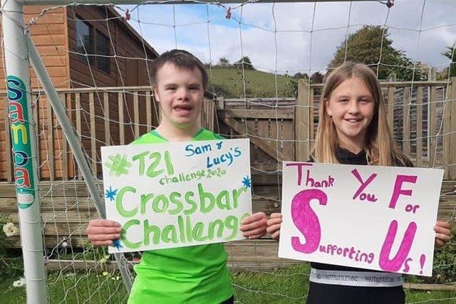 Supporters of Portsmouth Down Syndrome Association took on the T21 challenge to raise funds for the charity. Pictured: Sam and Lucy Ford