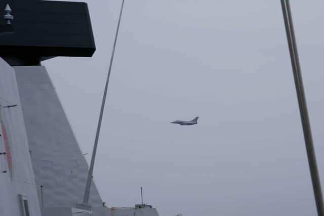 A jet pictured buzzing HMS Dragon during a war game at sea with the French. Photo: Royal Navy