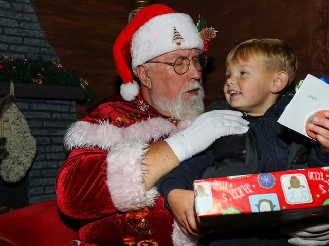 Albie, 3, meets Father Christmas. Leigh Park Christmas grotto at Greywell Shopping Centre, Leigh Park, Havant Picture: Chris Moorhouse (jpns 251123-42)