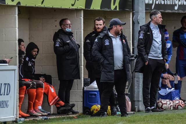 Portchester boss Dave Carter (with cap) looks on during his side's friendly loss to US Portsmouth. Pic: Daniel Haswell.