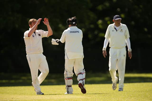 'Fingers' - AKA Rowner 1sts wicket-keeper James Osborn - celebrates catching Adam Smyth off the bowling of Matt Williams. Picture: Chris Moorhouse