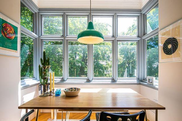 A dining room fits perfectly into the large bay window.