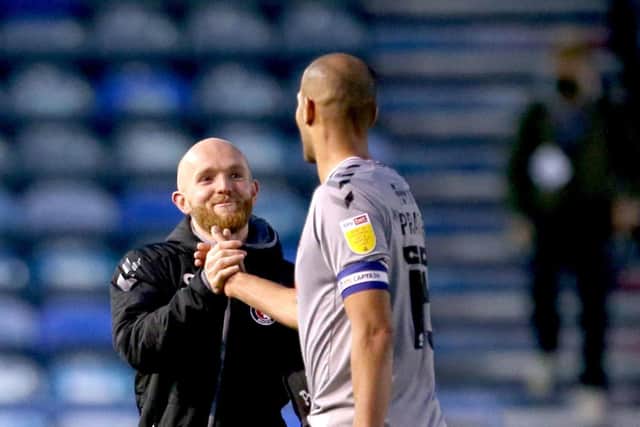 Darren Pratley celebrates with Johnny Williams after Charlton's win over Pompey. Pic: Steven Paston/PA Wire.