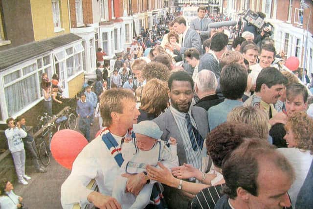 Kenny Swain, far left, on Pompey's open-top bus down Frogmore Road to mark promotion to the First Division in May 1987
