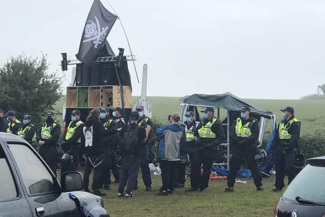 Photo from June 27 taken with permission from the Twitter feed of @Newsagentprovoc of an illegal rave in Steyning being broken up by police