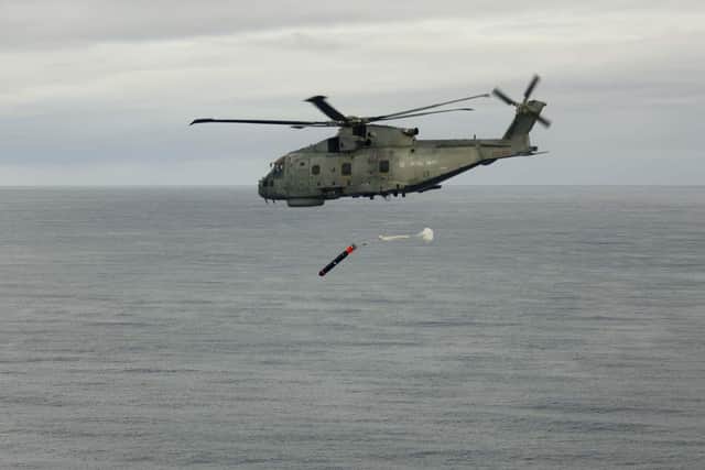Merlin Mk2 launching Stingray Training Variant Torpedos during exercises. Picture: 814 NAS.
