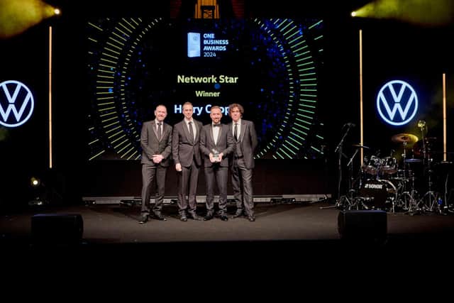 Harry Cooper accepting award