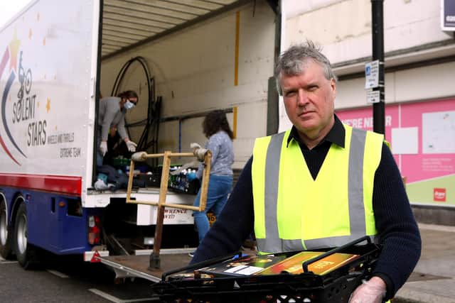 Council leader Sean Woodward volunteered to help transfer food from the closed food bank to a warehouse, ready for distribution by charity Acts of Kindness.