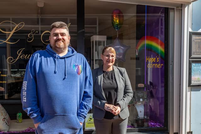Hope's father Steve Ayres with shop owner Lisa Jackson at L&A Jewellers.  
Picture: Mike Cooter