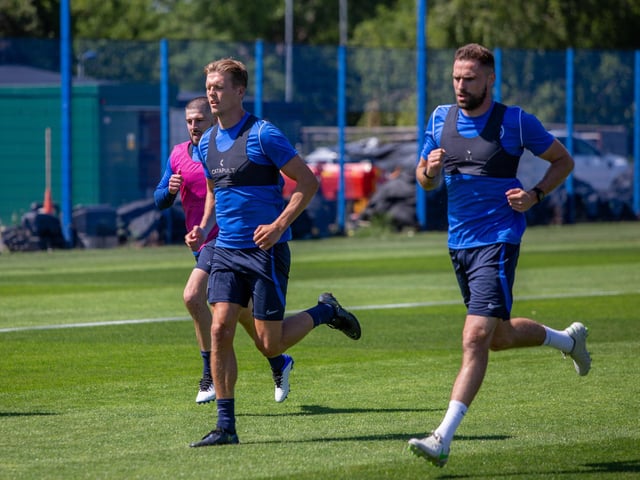 Kieron Freeman, Sean Raggett and Clark Robertson are put through their paces during pre-season in June 2022. Picture: Habibur Rahman