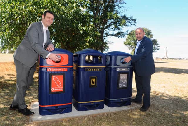 Portsmouth City Council is launching the second part of its Don't be a din, put it in the bin campaign unveiling new recycling bins around Southsea Common.
Pictured is: (l-r) Councillors Dave Ashmore, cabinet member for environment and climate change and Steve Pitt, deputy leader of Portsmouth City Council with the new recycling bins.
Picture: Sarah Standing (060820-2026)