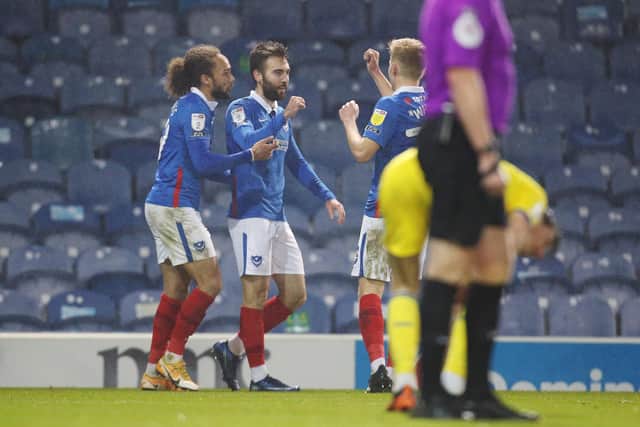 Ben Close celebrates after scoring Pompey's fourth and final goal in last night's victory over AFC Wimbledon. Picture: Joe Pepler