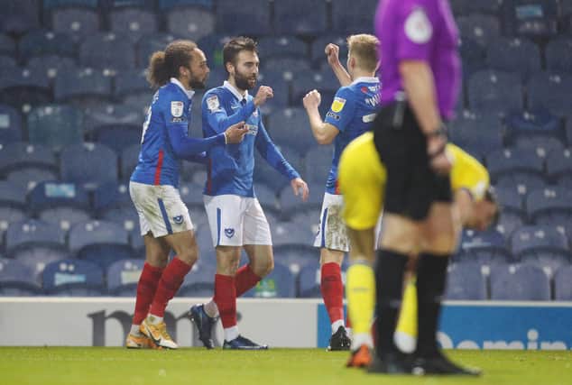 Ben Close celebrates after scoring Pompey's fourth and final goal in last night's victory over AFC Wimbledon. Picture: Joe Pepler