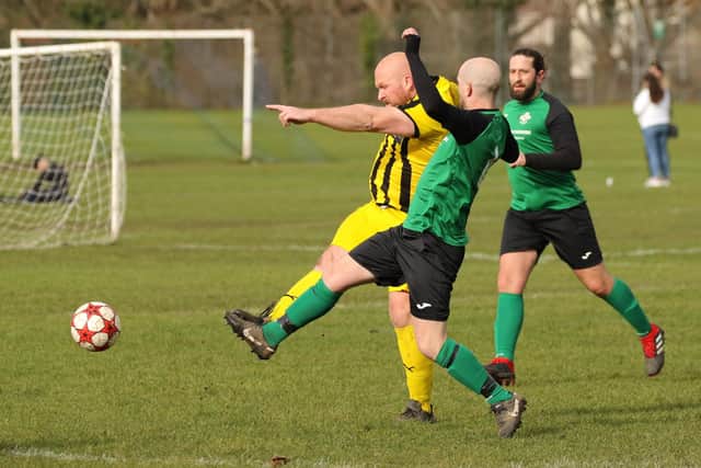 Co-Op Dragons (yellow) score against Saturn Royale. Picture: Kevin Shipp