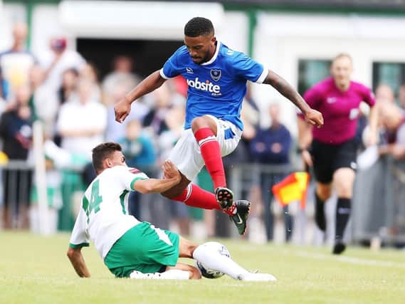 Former Pompey left-back Tareiq Holmes-Dennis in friendly action against the Rocks - one of only five appearances during his ill-fated loan spell