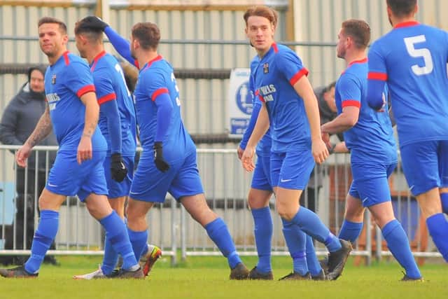 Jack Breed, second left, has just fired Fareham into an early lead at Horndean. Picture: Martyn White.