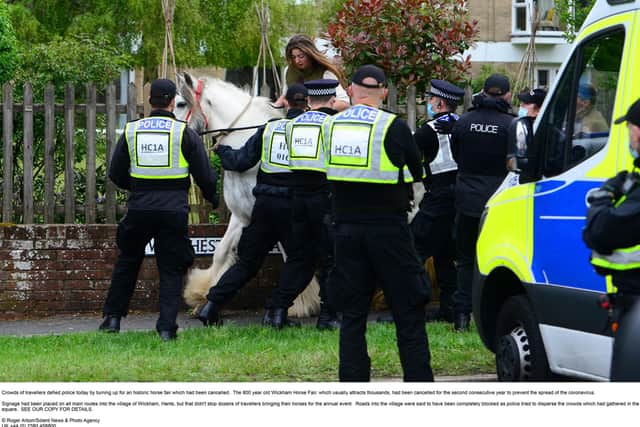 Crowds of Travellers defied police today by turning up for an historic horse fair which had been cancelled.  Picture: Roger Arbon/Solent News & Photo Agency